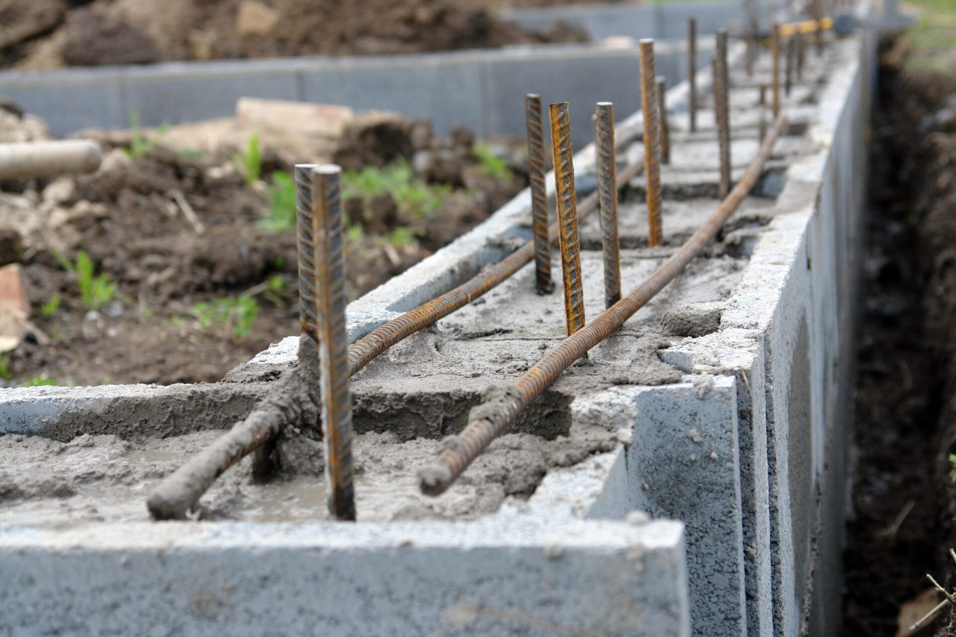 Closeup of house foundation made from concrete shuttering blocks